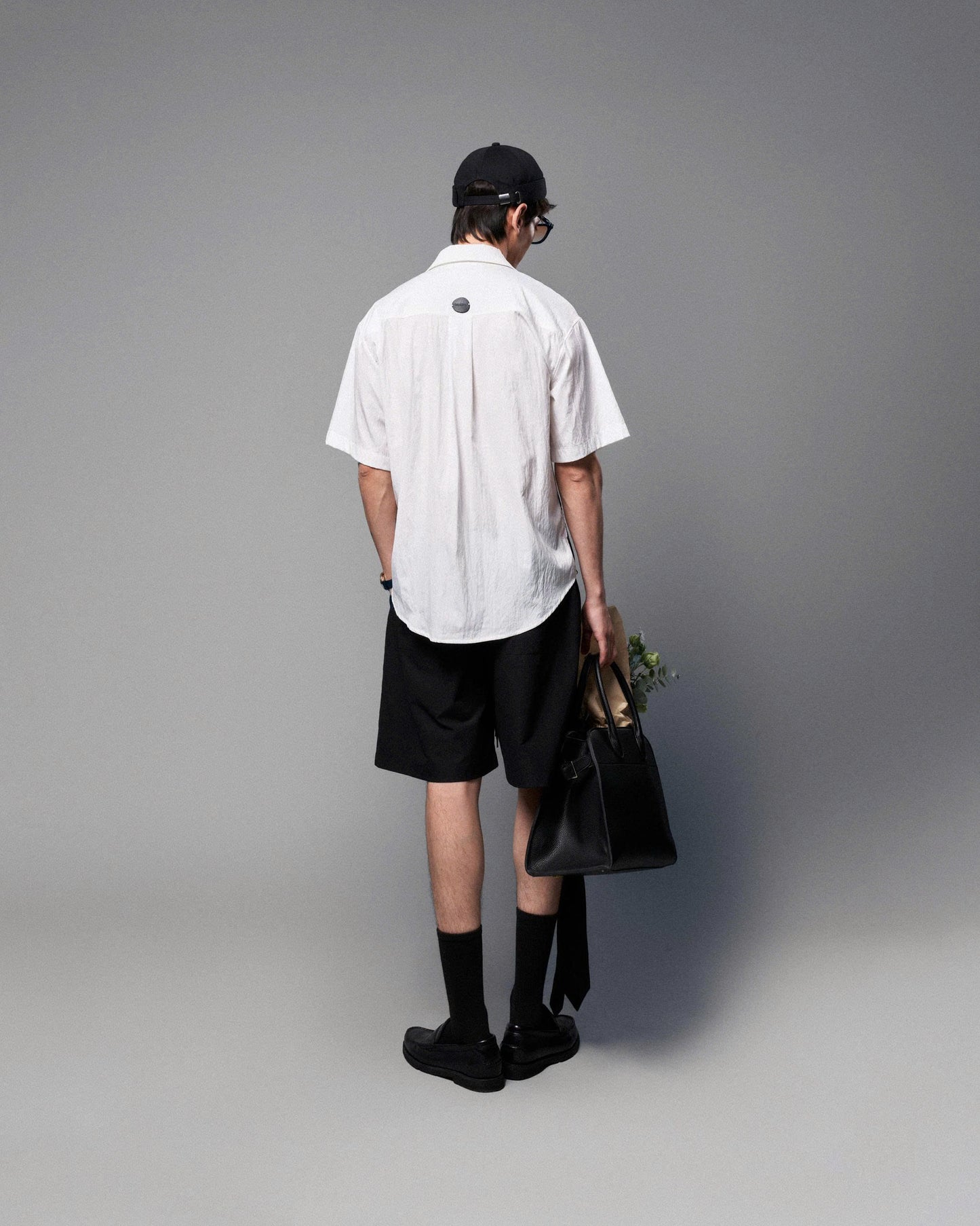 Áo sơ mi tay ngắn họa tiết đen trắng