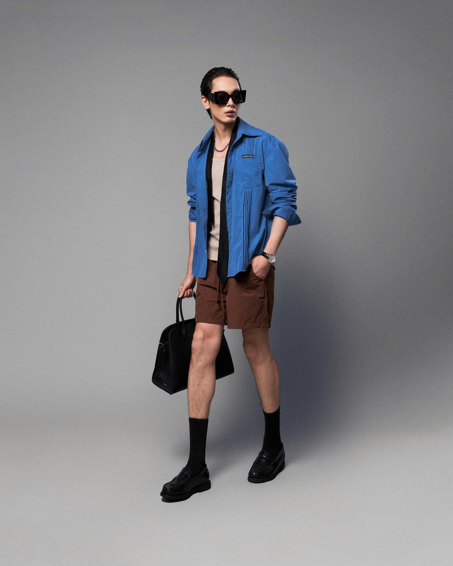 Quần shorts vải dù nâu