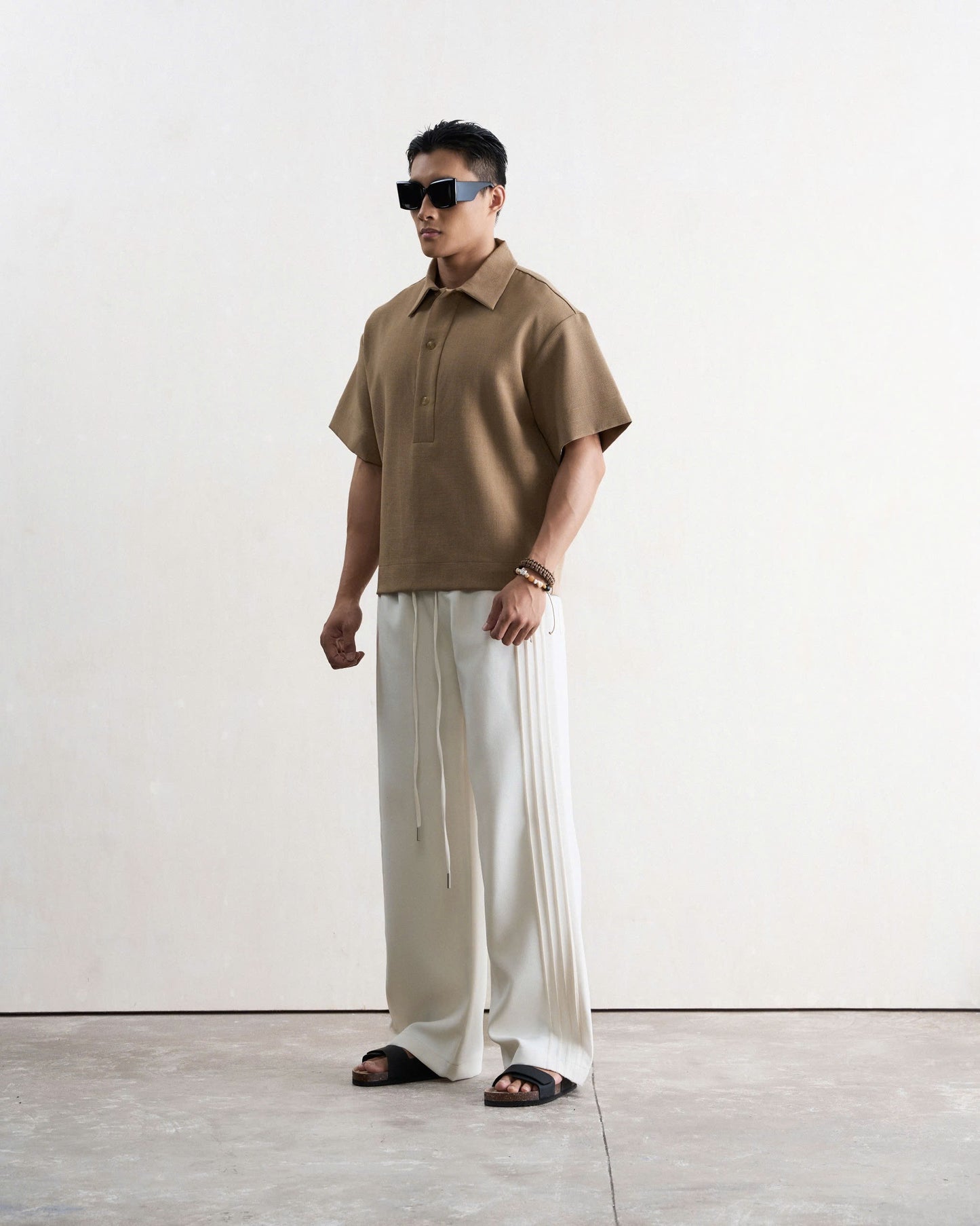 Áo polo nam form boxy màu nâu