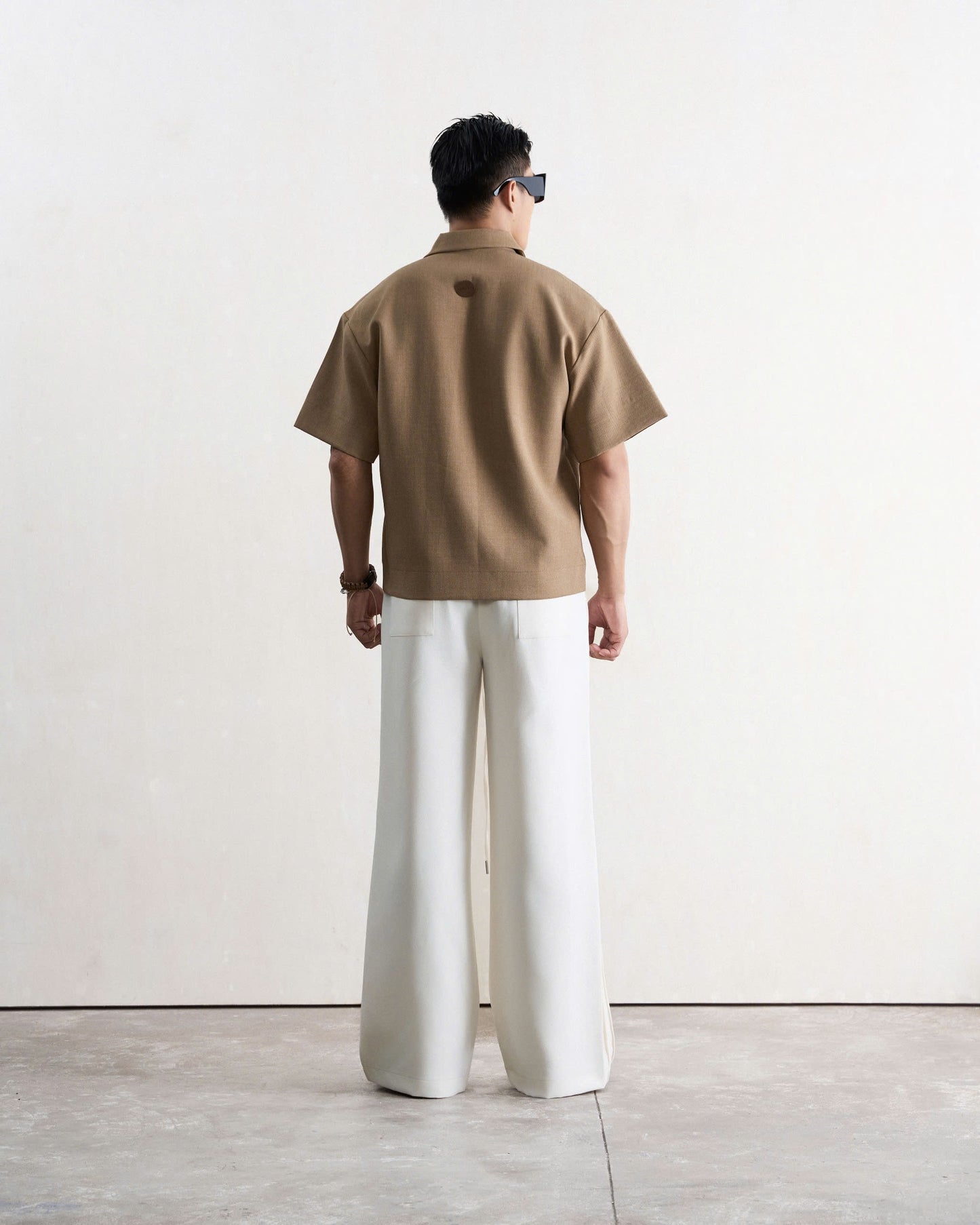 Áo polo nam form boxy màu nâu