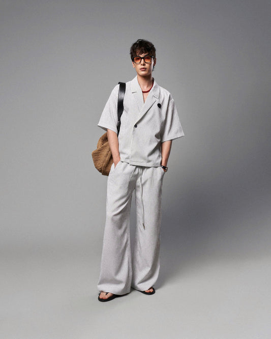 Quần dài ống rộng sọc dọc trắng